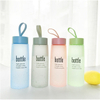 Eco-friendly 520ml frosted glass water bottle with rope water bottle wholesale