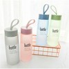 Eco-friendly 520ml frosted glass water bottle with rope water bottle wholesale