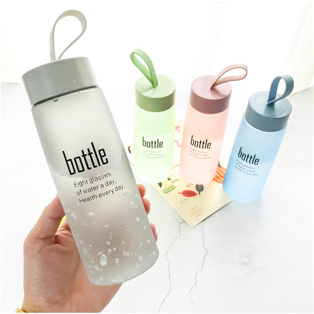 Eco-friendly 520ml frosted glass water bottle with rope water bottle wholesale
