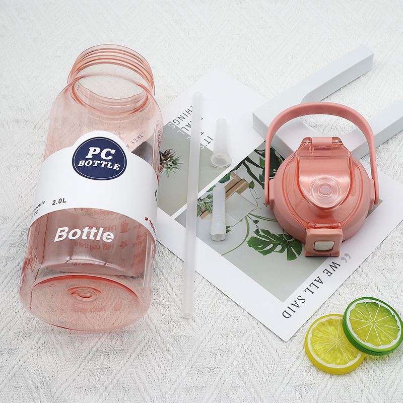 time marked water bottle with straw 