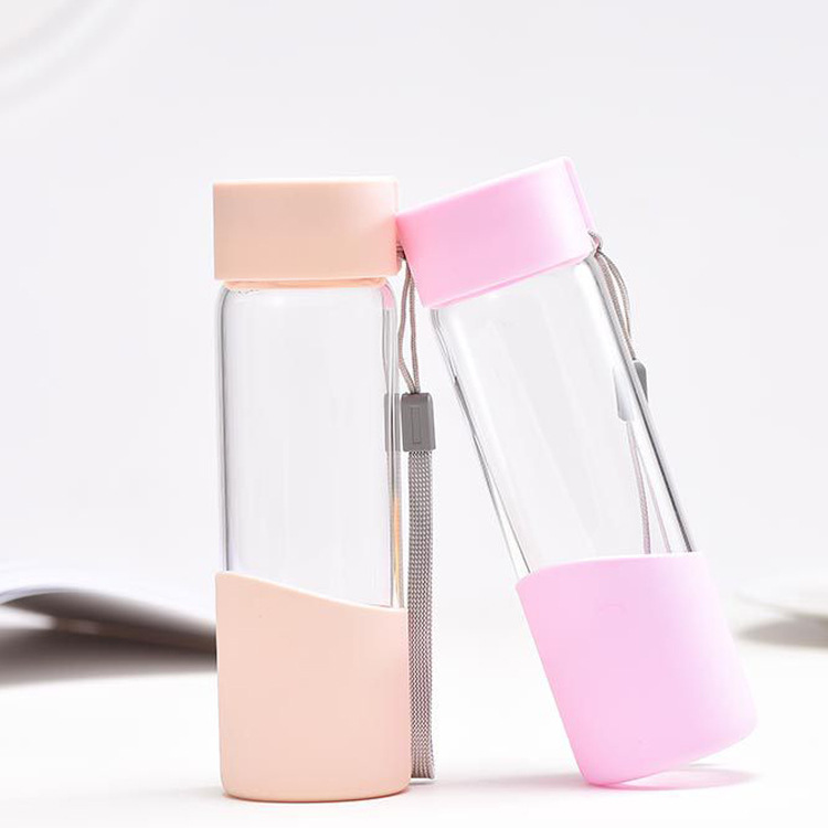 Wholesale 300ml fancy glass water bottle with silicone sleeve