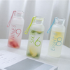 High Capacity Factory Frosted Glass Drinking Water Bottle with Sleeve Lid Decal