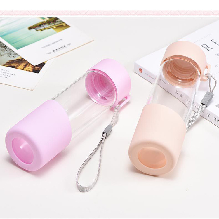 Wholesale 300ml fancy glass water bottle with silicone sleeve