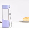 Wholesale 300ml fancy glass water bottle with silicone sleeve