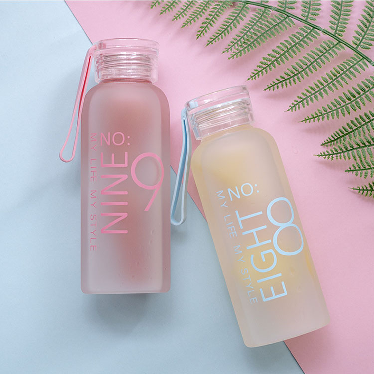 High Capacity Factory Frosted Glass Drinking Water Bottle with Sleeve Lid Decal