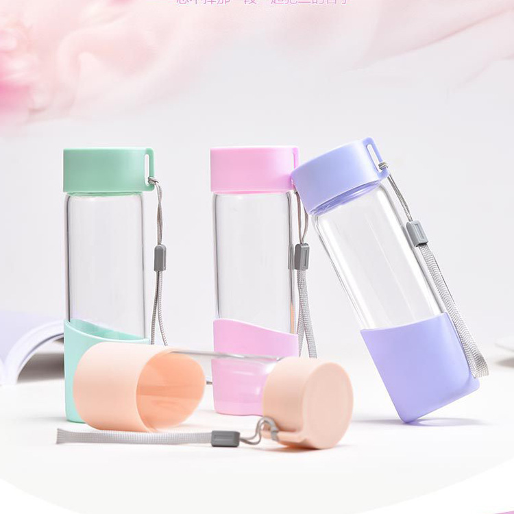 Wholesale 300ml fancy glass water bottle with silicone sleeve
